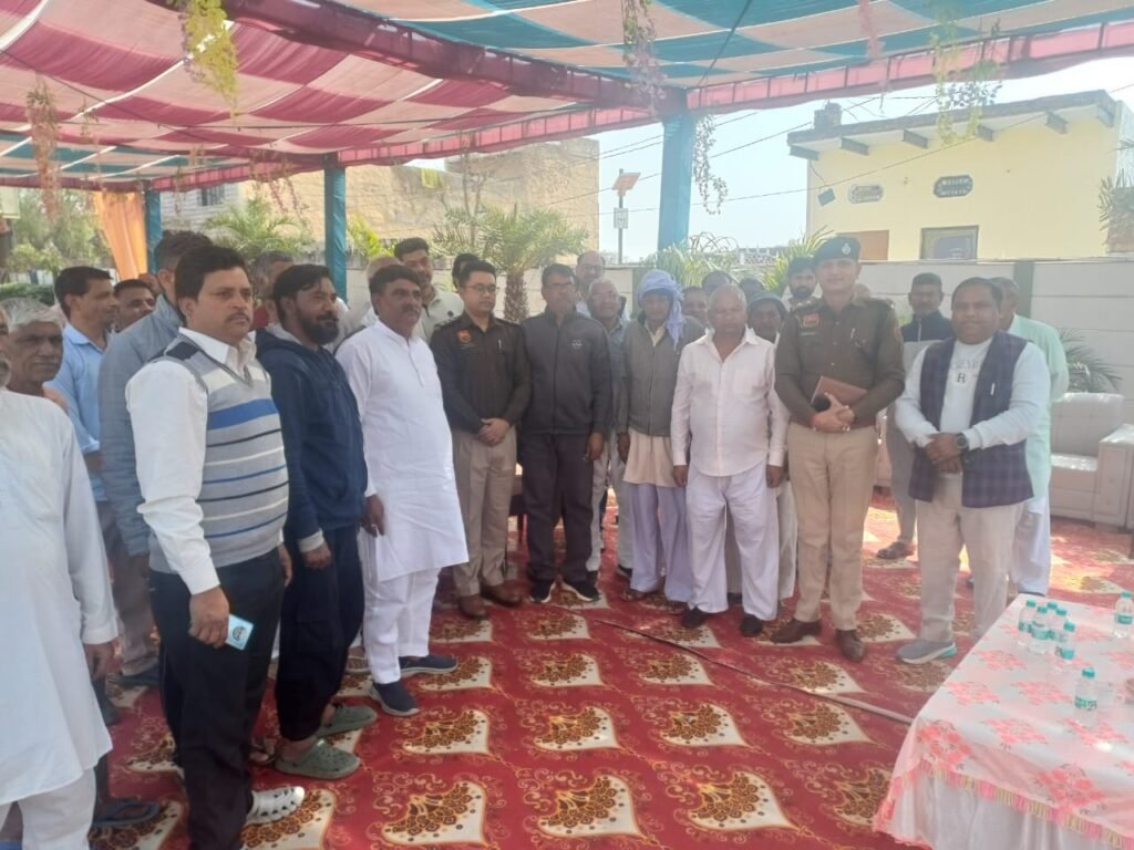 police vist village